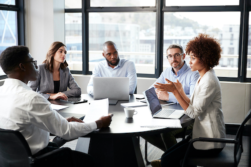 property managers discussing a rental property and their rental property listings